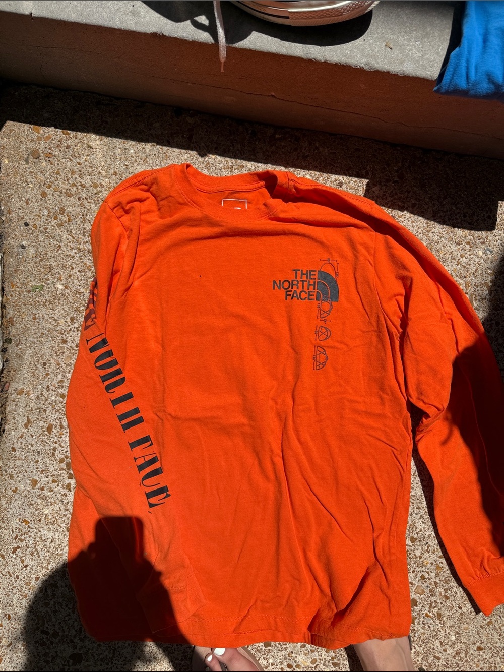The North Face Men’s Long Sleeve Crew Shirt - Bright Orange with Black Logo